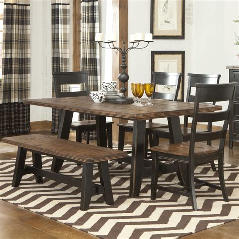 Why we love this dining set Seats up to 2 people; Fits perfectly behind a couch as a console table; The table comes with comfortable footrests. . Target dining set